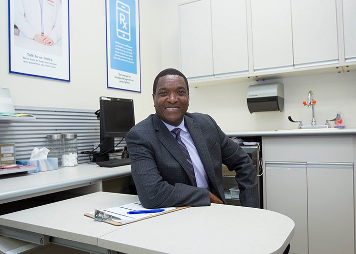 photo of Ian Stewart seated at desk