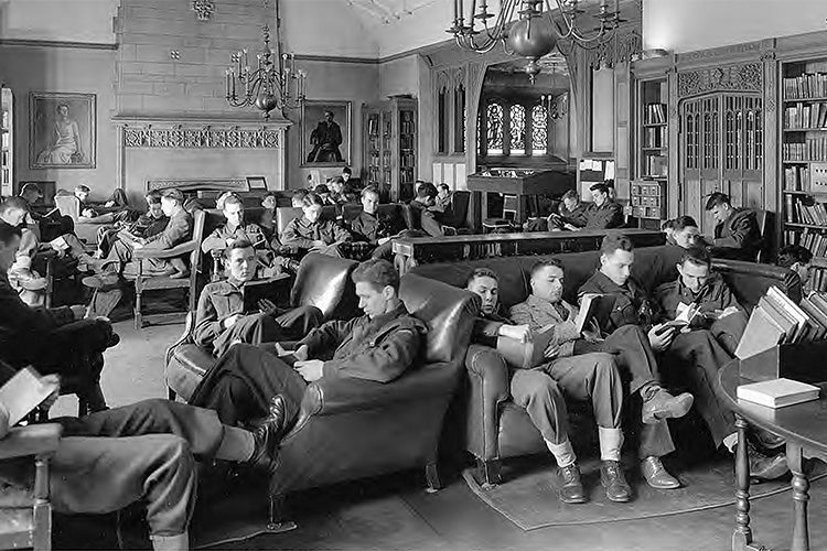 soliders reading books inside hart house library