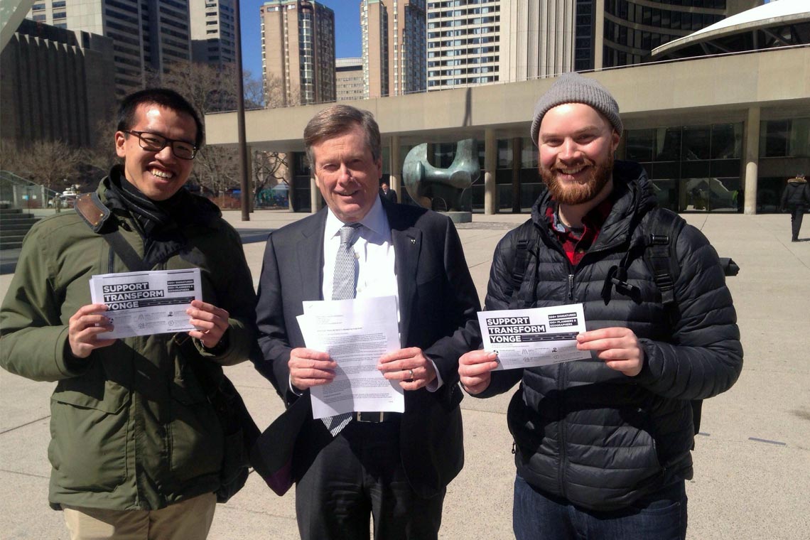 Mayor Tory with planning students holding a petition