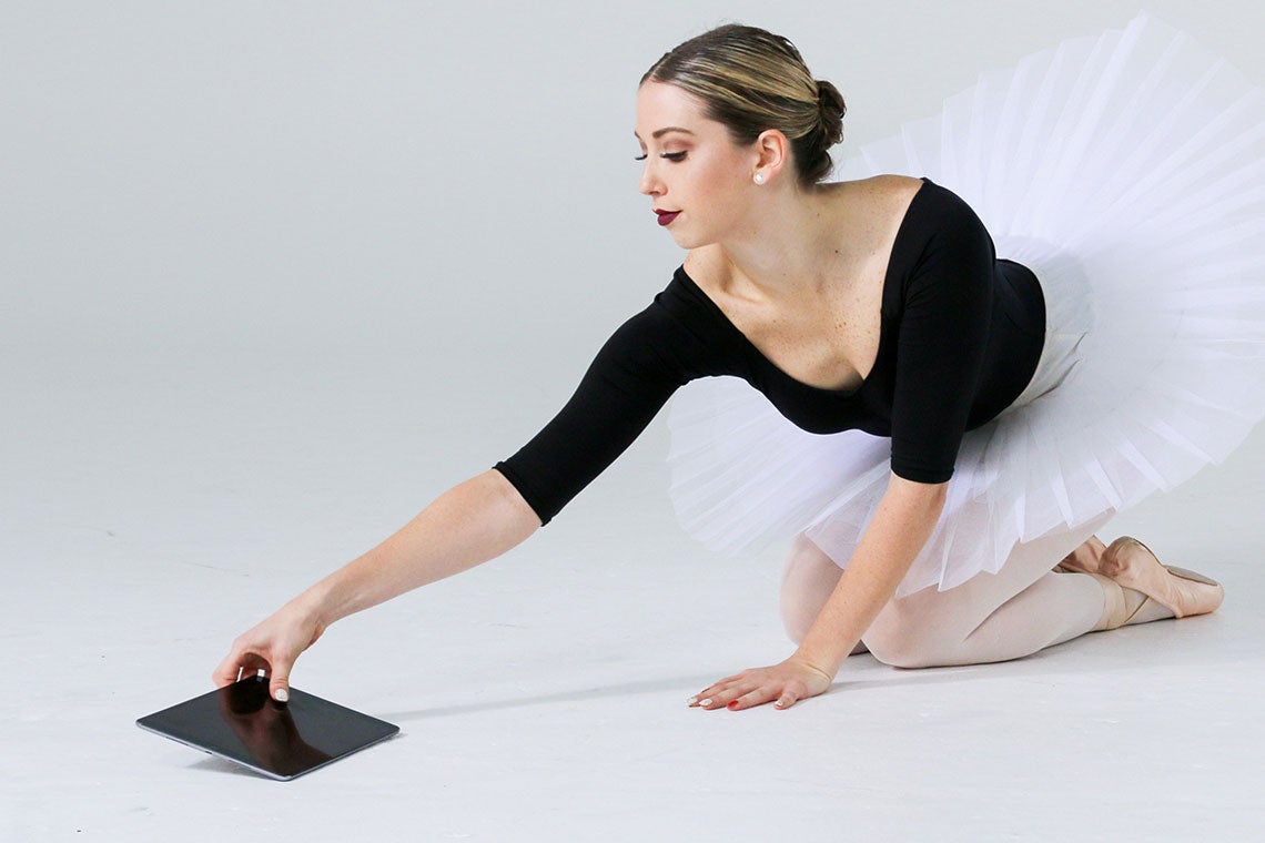 The StageKeep dance app is illustrated with a photo of a kneeling ballet dancer reaching for a tablet computer