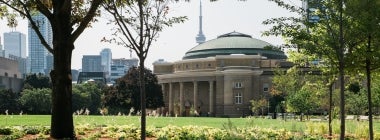 Convocation Hall in the spring with green grass and trees