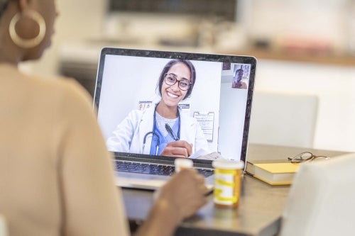 Woman having a virtual meeting with a clinician