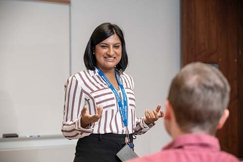 U of T faculty member speaking in classroom 