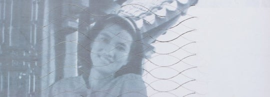A greyed out image of a woman