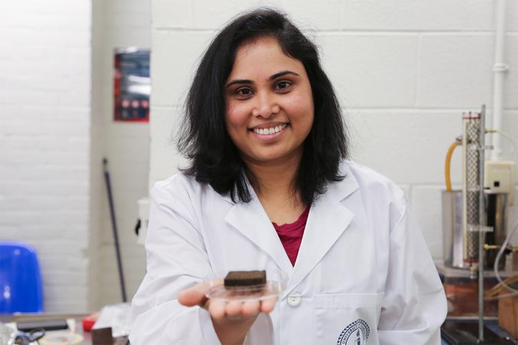 Pavani Cherukupally holds one of the special polyurethane sponges