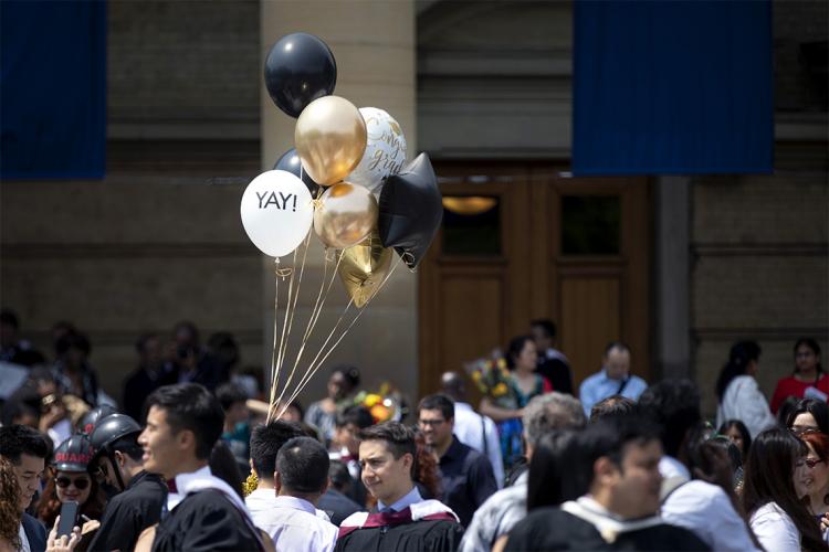 Balloon with the word Yay, seen in front of convocation hall