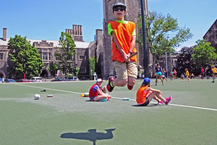 photo of Quidditch player on broomstick, aloft