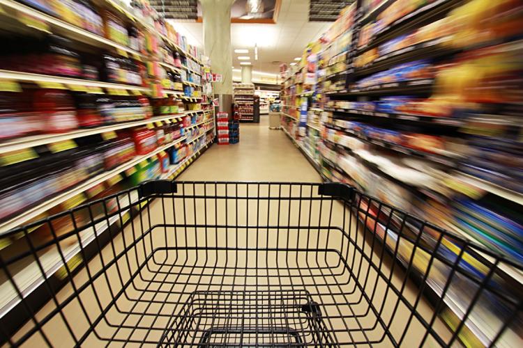 Photo of empty cart in grocery store