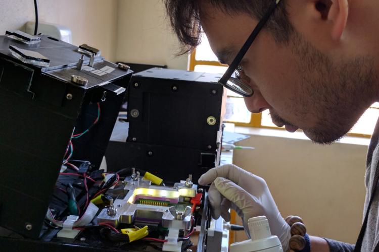 Photo of Alphonsus Ng running blood tests for lap on a chip