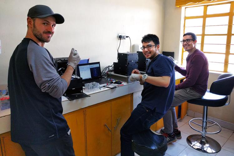 Photo of researchers in temporary lab in Kenya