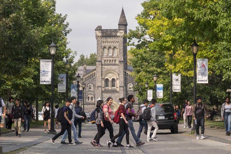 Photo of students walking on campus