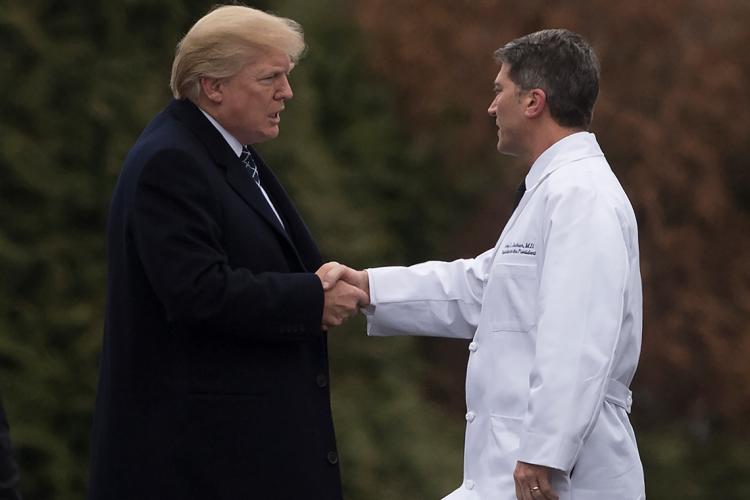 photo of Donald Trump shaking hands with doctor