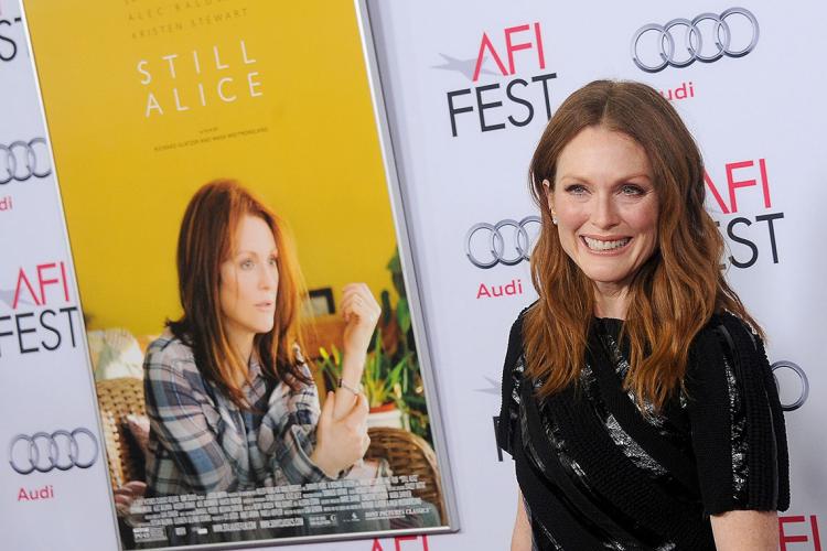 Photo of Julianne Moore and Still Alice poster
