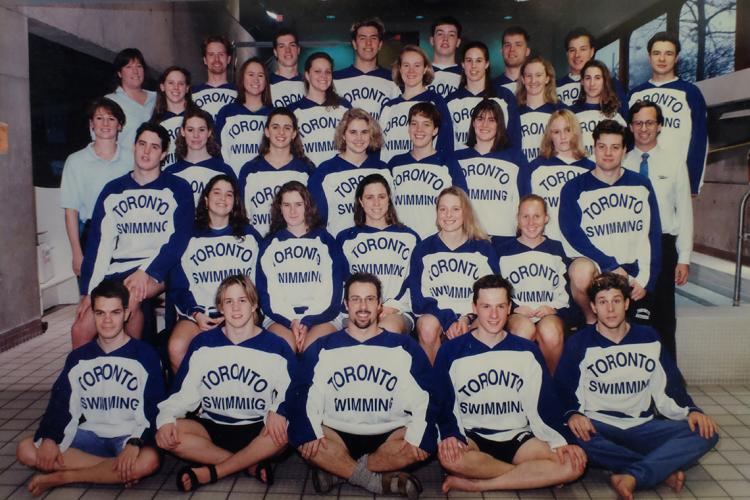 Photo of Catherine McKenna and 1993-1994 swimming teams