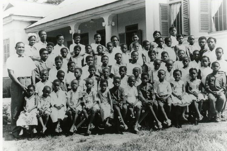 Andrew Foster with students from the boarding school for deaf children in 1961