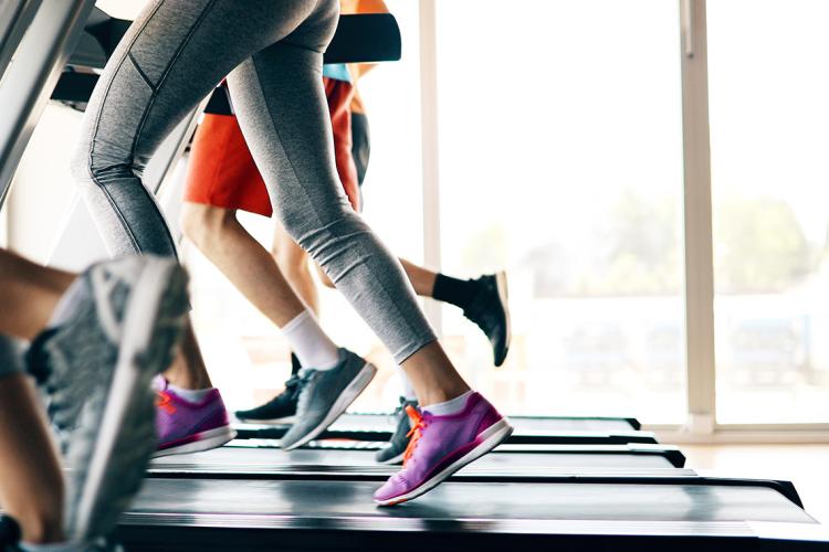 Photo of people working out on treadmill