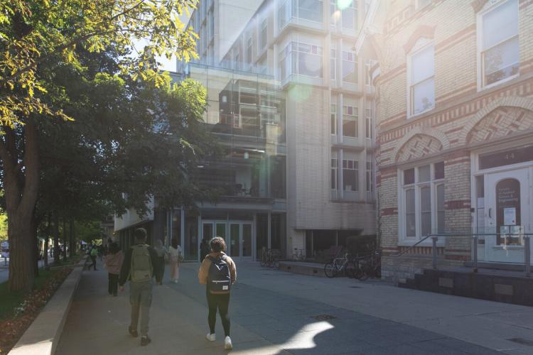 students walk along St. George st at U of T's downtown campus