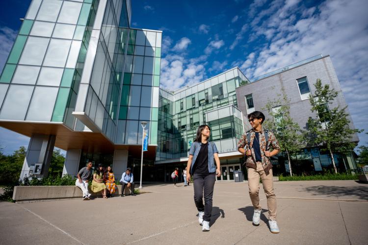 Two U of T students in conversation.