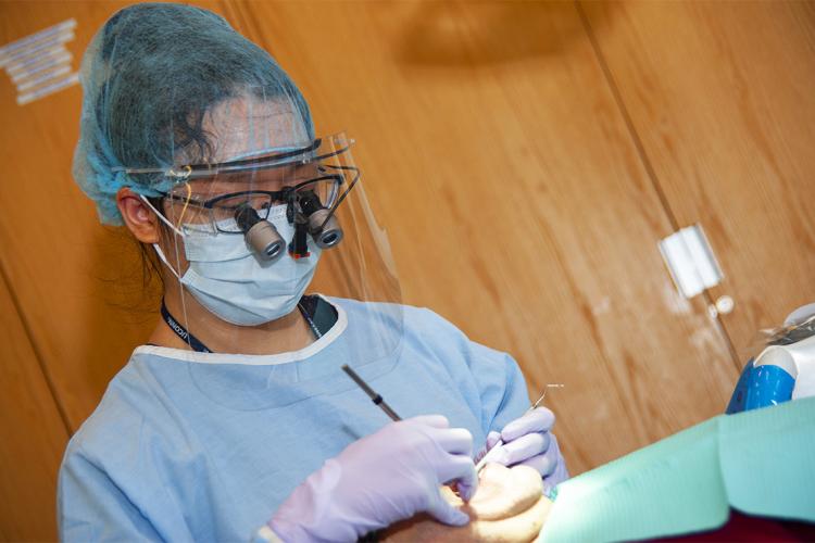 Dentist with PPE