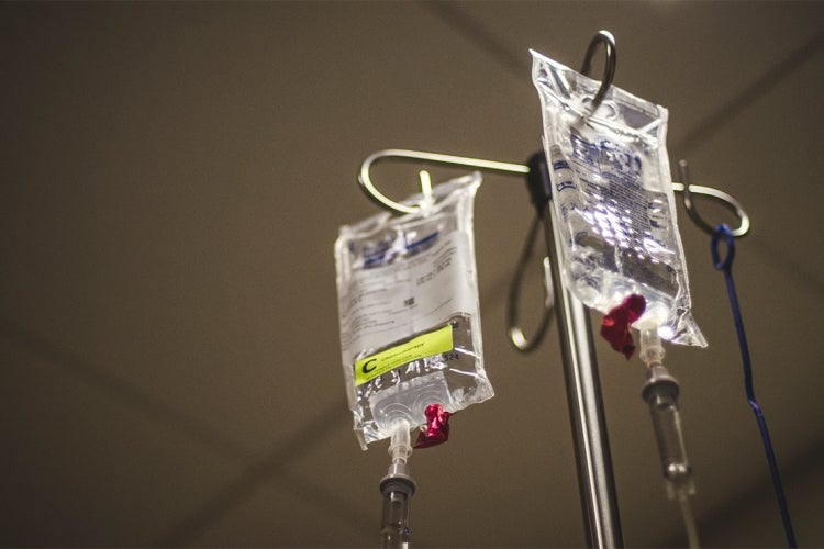 chemotherapy drug IV bags on a stand