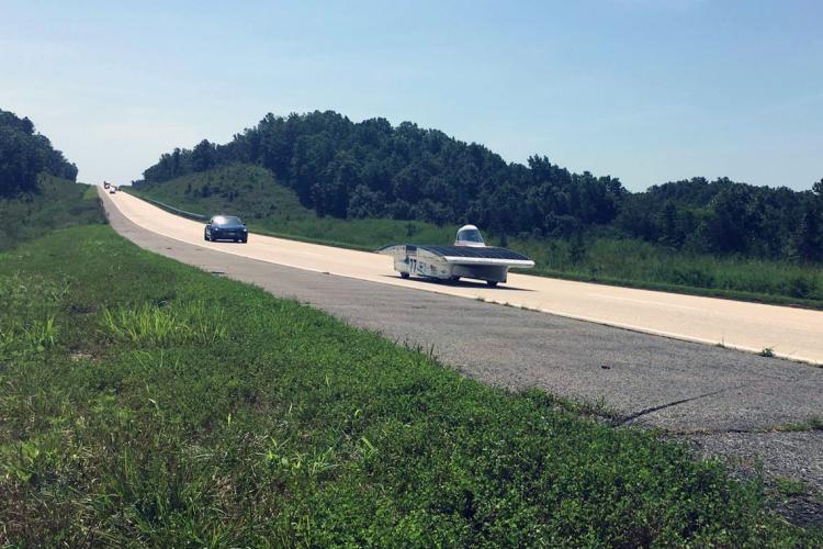 photo of solar car on highway