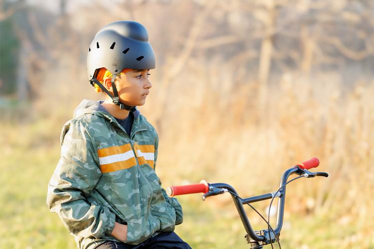 Child wearing new helmet for Sikh kids