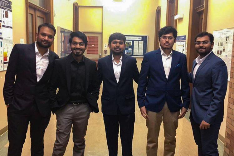 Group shot of the U of T students behind the RoboBin