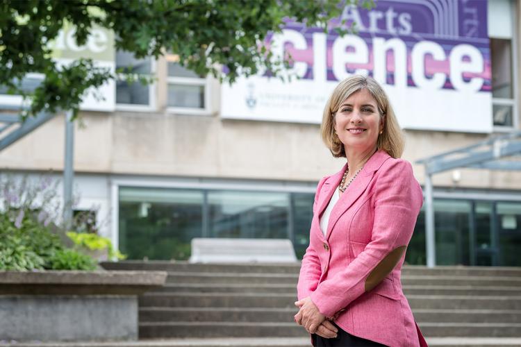 Portrait of Melanie Woodin outside Sidney Smith Hall