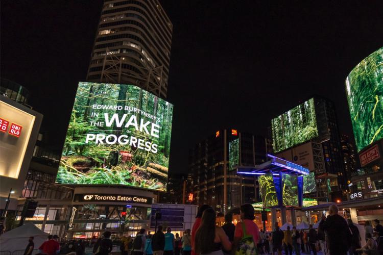 In the  Wake of Progress being screened at yonge dundas square during luminato in Toronto