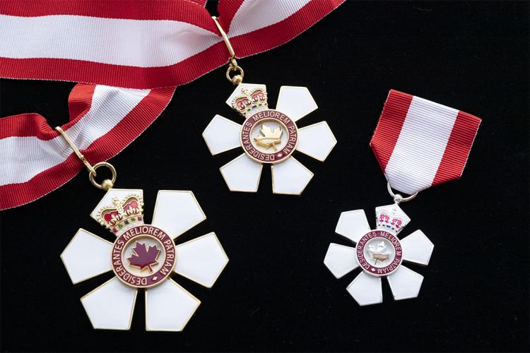 Order of Canada insignia on a black background