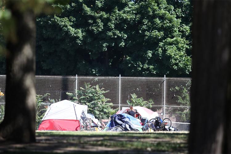 homeless people set up tents in moss park