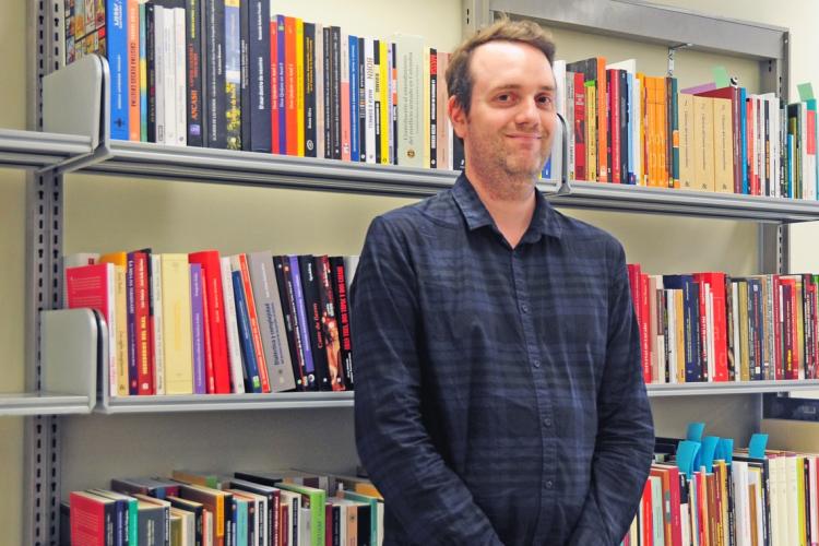 Copyright outreach librarian Graeme Slaght helps professors digitize their course material. (Photo by Romi Levine)