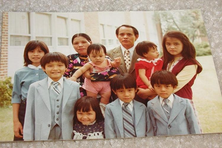 Associate Professor Nhung Tuyet Tran with her family in Michigan soon after arriving in America as a Vietnamese refugee. She is pictured standing in the bottom row with her brothers (photo courtesy of Nhung Tuyet Tran)