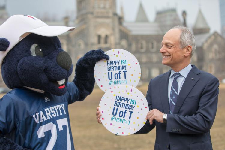 Photo of U of T President Meric Gertler and mascot