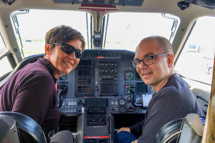 Tracey Galloway and Chris beck in the cockpit of a plane