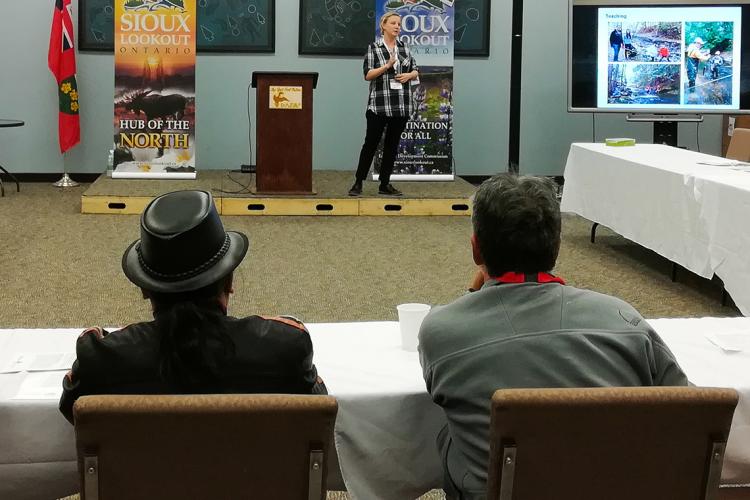 Photo of Jennifer Drake delivering a presentation at Sioux Lookout
