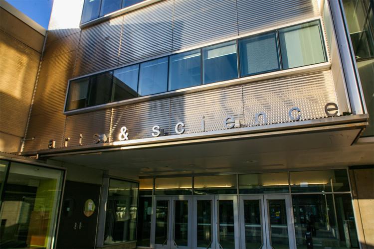The signage at the main entrance of Sidney Smith Hall reads Arts and Science