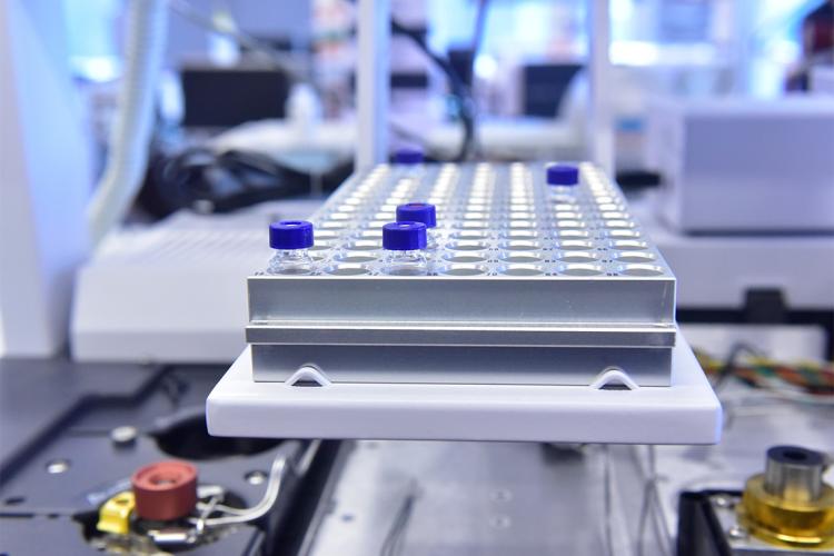 A tray of test tubes in a lab