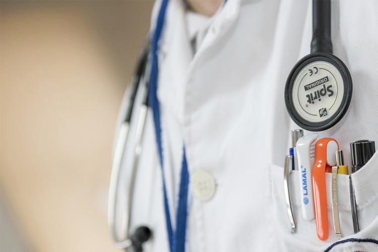 Close-up photo of doctor's lab coat