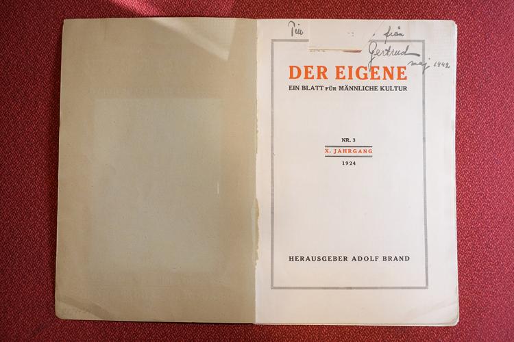 Photo of a copy of Der Eigene with a piece of the inscription missing
