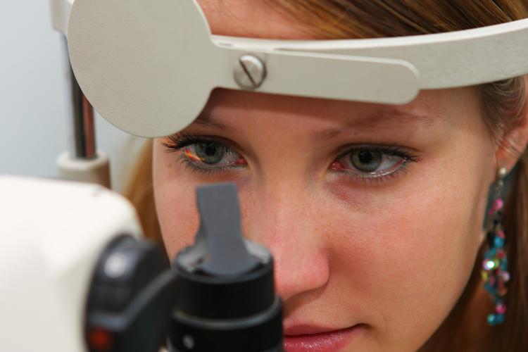 Woman undergoing an eye exam