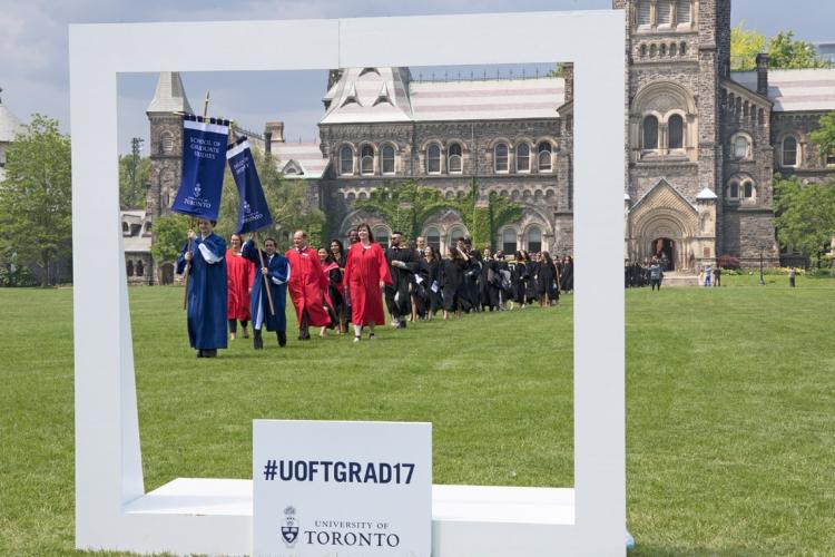 students on campus with the social frame during convocation