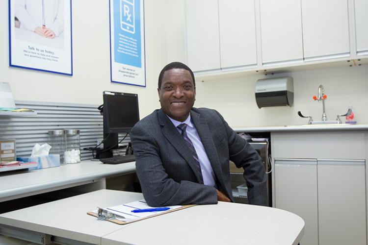 photo of Ian Stewart seated at desk