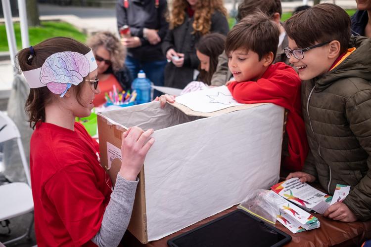 Children participate in a psychology experiment at Science Rendezvous