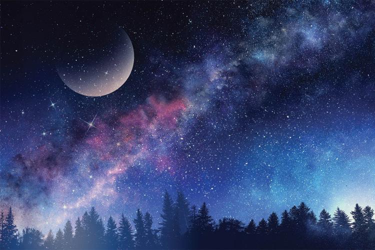illustration of the milky way and a crescent moon 