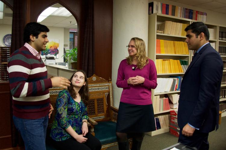 Jeannie Miller with three of her students