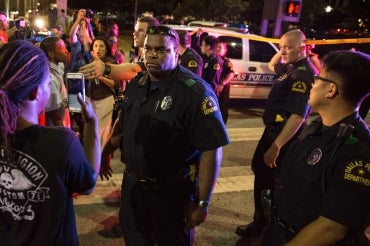 Getty photo of police and protesters