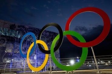 image of Olympic rings in Rio at night