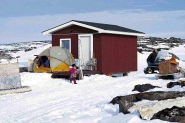 photo of house and children in the north