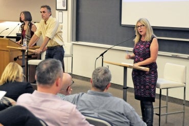 photo of Moran, Peterson and Cossman at forum